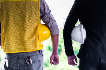 Back view of architect, Engineer,technician at  site working