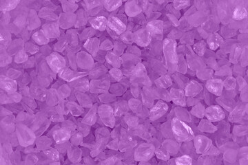 Purple textured beach glass closeup background