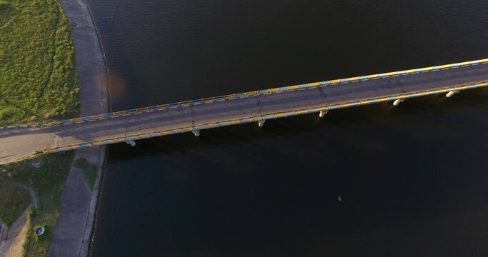 Aerial view to bridge on river at sunset, Severskiy Donets river