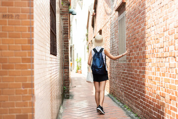 woman walking in the old street at Lukang town