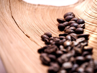 Coffee beans in a bag on wooden background , Coffee time