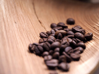 Coffee beans in a bag on wooden background , Coffee time