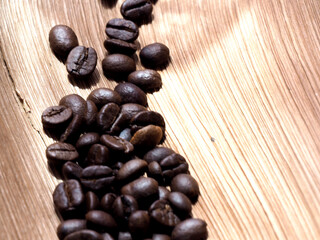 Coffee beans in a bag on wooden background , Coffee time