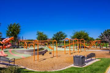 Orange Playground Equipment At Free Public Park