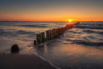 Sunset on the Baltic Sea in Miedzyzdroje, Zachodniopomorskie, Poland - obrazy, fototapety, plakaty