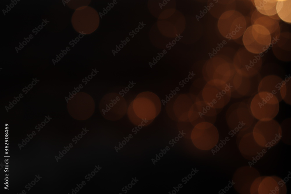 Wall mural gold abstract bokeh background, festive xmas abstract background with bokeh defocused lights and sta