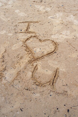 Fototapeta na wymiar I Love U is The Message Written in The Sand