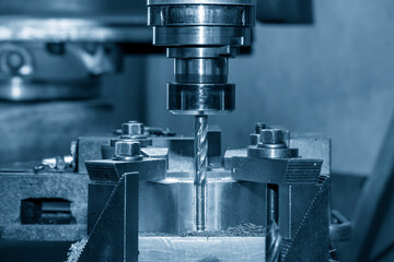The milling machine make the hole on the work pieces by drill tools. The metal working process by...