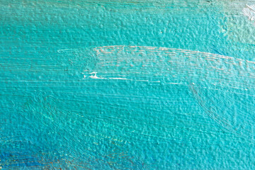 Background with oil paint in the color of turquoise waves. Beautiful brushstrokes close-up....