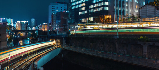 Fototapeta na wymiar Trains pass through Ochanomizu train station in Tokyo, Japan