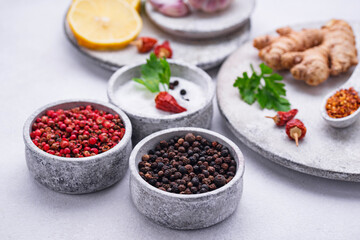 Different Asian spices in small bowls