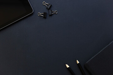 Top view flat lay of business working place. Empty workspace on table. Black minimalism