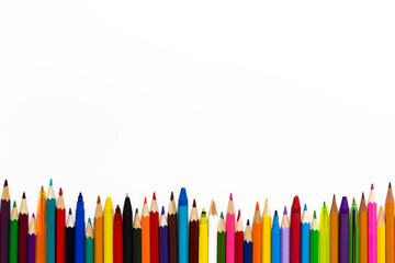 Color pencils, pens and wax crayons border isolated on white background. Mockup