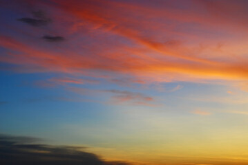 Emotional colorful sky after sunset. A magical nature phenomenon in every day life. Evening sky background.