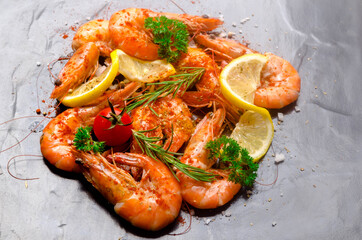 Close up  shrimp with seasoning spice and herb on black background.