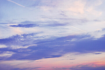 Beautiful sky with pink clouds. Colorfull cloudy sunset. Sky texture. 