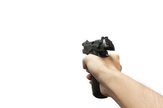 Pistol handgun weapon in hand in first person view isolated on white background