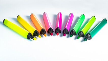 Multi-colored felt-tip pens on a white background. Tools for drawing and creativity. Bright colors....
