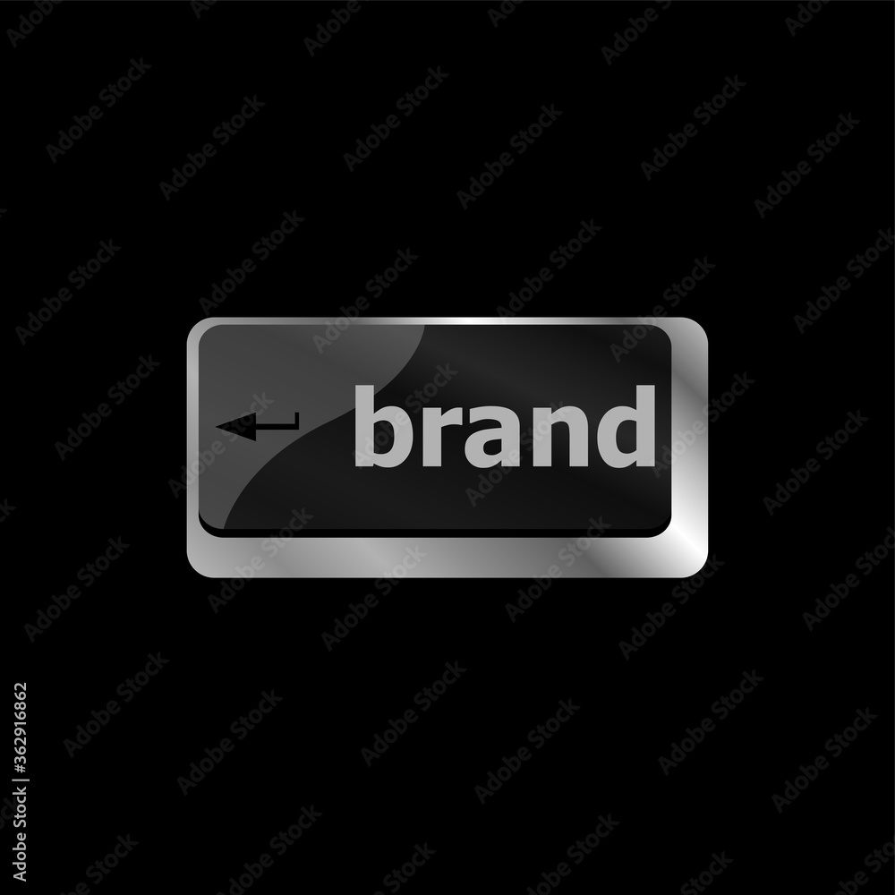 Poster wording brand on computer laptop keyboard keys