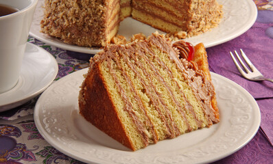 Closeup of nut cake on white plate.Studio shot.