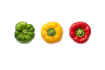Three fresh peppers (green, yellow, red) isolated on white.Studio shot.
