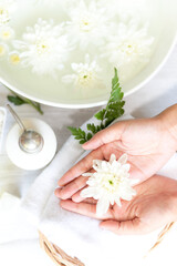 Fototapeta na wymiar Spa beauty massage health wellness. Spa Thai therapy treatment aromatherapy for nail and hands woman with white flower nature candle for relax and summer time.