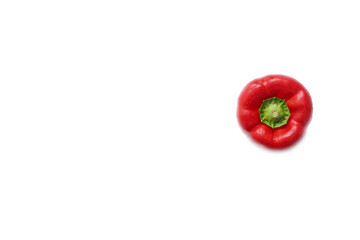 One raw red pepper isolated on white.Studio shot