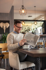 Man reading newspaper