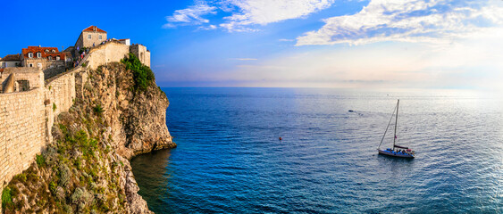 Croatia travel. ancient Dubrovnik town. Popular tourist and cruise destination. view of fortified wall and castle