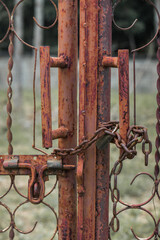 Rust fence with rust chain locked