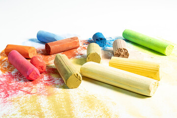 Multi-colored pastel crayons. Materials for drawing and creativity. Bright water-based paints. School supplies. Hobbies and creativity