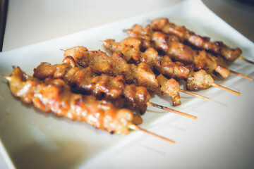 grilled chicken wings on skewer