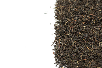 Leaves of black premium dry tea on a white background