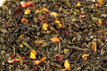  Leaves of Chinese Dry Tea Top Grade with Goji Berries and Powdered Acai on White Background