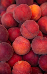 fruits peaches. Texture background of sweet red ripe peaches. vegetarian food fruit peaches.