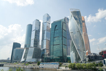 Fototapeta na wymiar modern skyscrapers business center with blue sky and clouds, reflections on glass, Moscow city