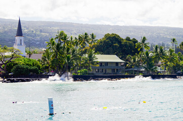 Panoramic view of city of Kailua Kona on Big Island on Hawaii with shore or coast line, palm trees...