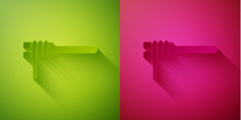 Paper cut Pasta spaghetti on the fork icon isolated on green and pink background. Italian restaurant. Paper art style. Vector.