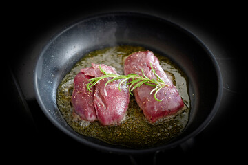 cooking at home - roasted game meat from a chamois buck