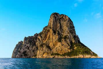 The steep cliffs on the northeastern side of the Island of Capri, Italy bathed in the morning sunshine