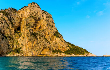 Obraz premium High caves punctuate the cliffs on the north eastern side of the Island of Capri, Italy
