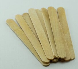 Ice cream sticks on a white background