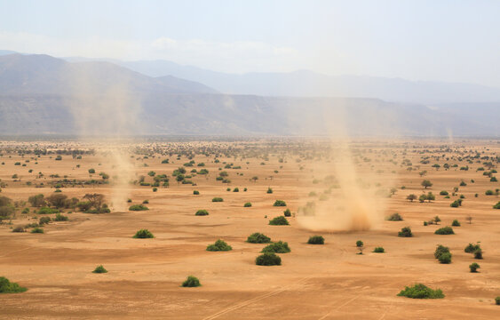 Aerial view of dust devils in Shompole conservancy area in the Great Rift Valley, near Lake Magadi, Kenya.