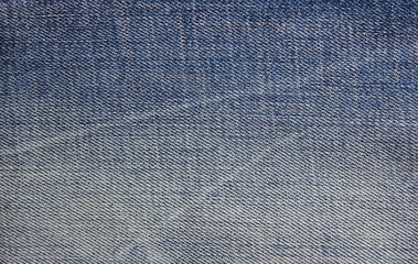 Denim jeans texture background. Wide horizontal light blue and white color jeans fabric, empty cloth surface with blank copy space