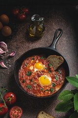 Shakshuka, middle eastern fried eggs with spicy tomato sauce