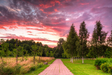 Beautiful sunset over the public park in Pruszcz Gdanski, Poland.