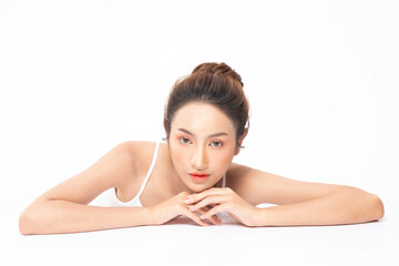 Beautiful Asian woman looking at camera smile with clean fresh skin
