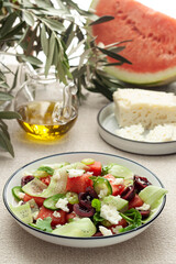 fresh Salad with watermelon, cucumber, cherries and cheese