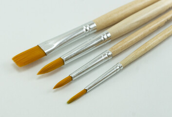 Paint brushes on a white background