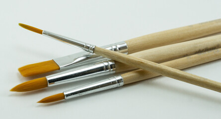 Paint brushes on a white background